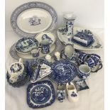 A box of assorted blue and white ceramics.