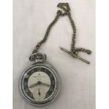 A vintage Ingersoll Triumph pocket watch with watch chain.
