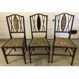 3 Edwardian mahogany bedroom chairs with tapered legs and upholstery seats and back panel.