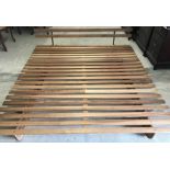 A wooden slated "Shindai" futon style King size bed frame by Yasuragi Design, Australia.