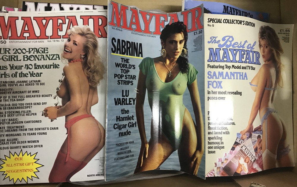 A box of vintage Mayfair magazines.