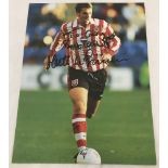 A signed picture of Matt Le Tessier in Southampton football strip.