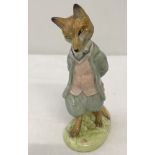 A Beswick figure of Beatrix Potter's Foxy Whiskered Gentleman.