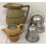 Two bell shaped vintage metal cannisters.