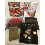 A collection of confectionary and pastry books.