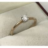 A 9ct gold .25 ct diamond solitaire ring.