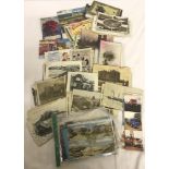 A collection of vintage postcards to include vintage Christmas cards, landscapes and comical.