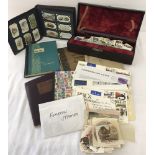 A collection of vintage stamps albums, cigarette album and stamps .