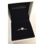 A boxed Pandora Delicate Hearts ring. Size 54.
