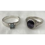 2 silver dress rings.