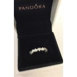 A boxed Pandora sparkling Stars ring. Size 54.