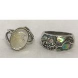 2 silver dress rings.