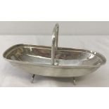 A silver trug shaped dish with hallmarked handle.