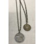 A silver St Christopher pendant on a 22inch silver rope chain.
