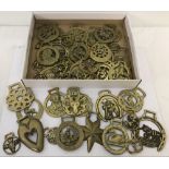 A collection of vintage horse brasses.