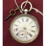 A 935 silver cased pocket watch with subsidiary second hand and complete with watch key.
