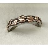 A 925 silver and welsh gold clogau band ring.