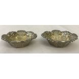 A pair of decorative Victorian octagonal shaped silver salts.