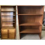 A vintage teak shelving unit with 2 door cupboard base together with a 3 shelf dresser top.