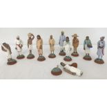 A collection of 11 x 1930's Indian painted plaster figurines, as sold by street sellers.