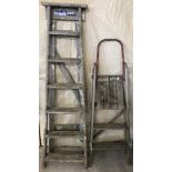 2 sets of vintage wooden step ladders.