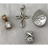4 small silver pendants.