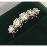 A 18ct gold 5 stone diamond eternity ring. Approx. 1.00 carat of diamonds.