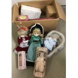 A quantity of 8 boxed and 4 unboxed porcelain collectors dolls.