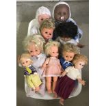 9 vintage vinyl dolls. Large and medium sizes.