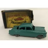 A boxed Matchbox #33 Ford Zodiac in teal green.