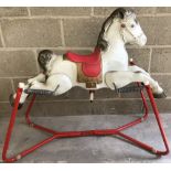 A c1970's MOBO tin rocker horse.