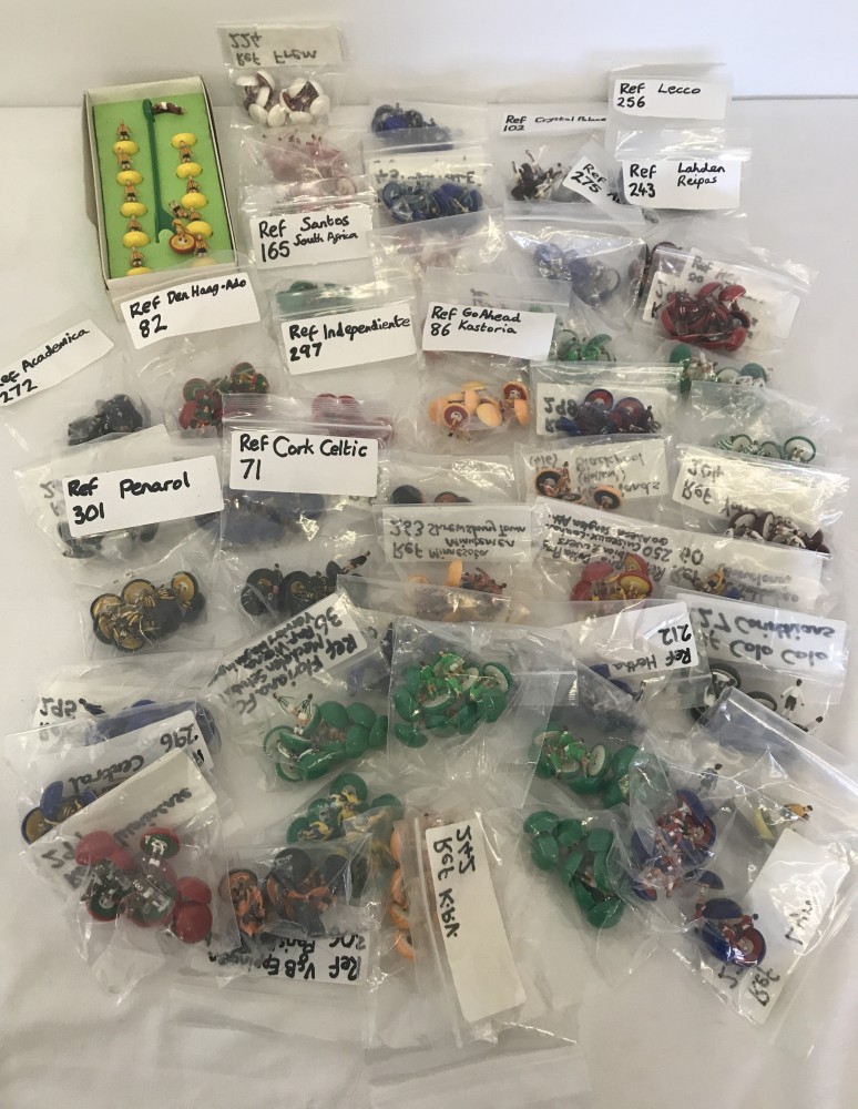 A box of Subbuteo teams.