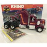 A boxed 1985 Kenner Parker Toys "Mask" Rhino Toy.