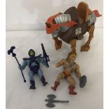 3 vintage Mattel 1980's Masters of the Universe action figures and weapons.