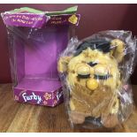A vintage 1999 boxed Tiger Toys Electronic Furby.