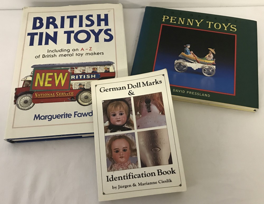 3 reference books on toys & dolls.