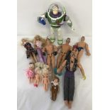 A quantity of assorted action figure dolls.