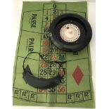 A boxed vintage home roulette game by K.& C. LTD., London.