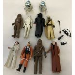 A collection of 10 vintage 1977 star wars figures.