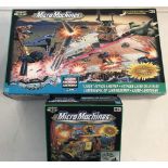 Two Micro Machines playsets.