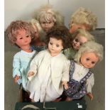 7 vintage larger vinyl dolls.