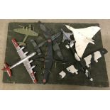 7 assembled and painted kit military aeroplanes to include a Vulcan.