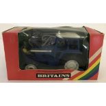 A boxed Britains #9523 Ford TW-20 Tractor.