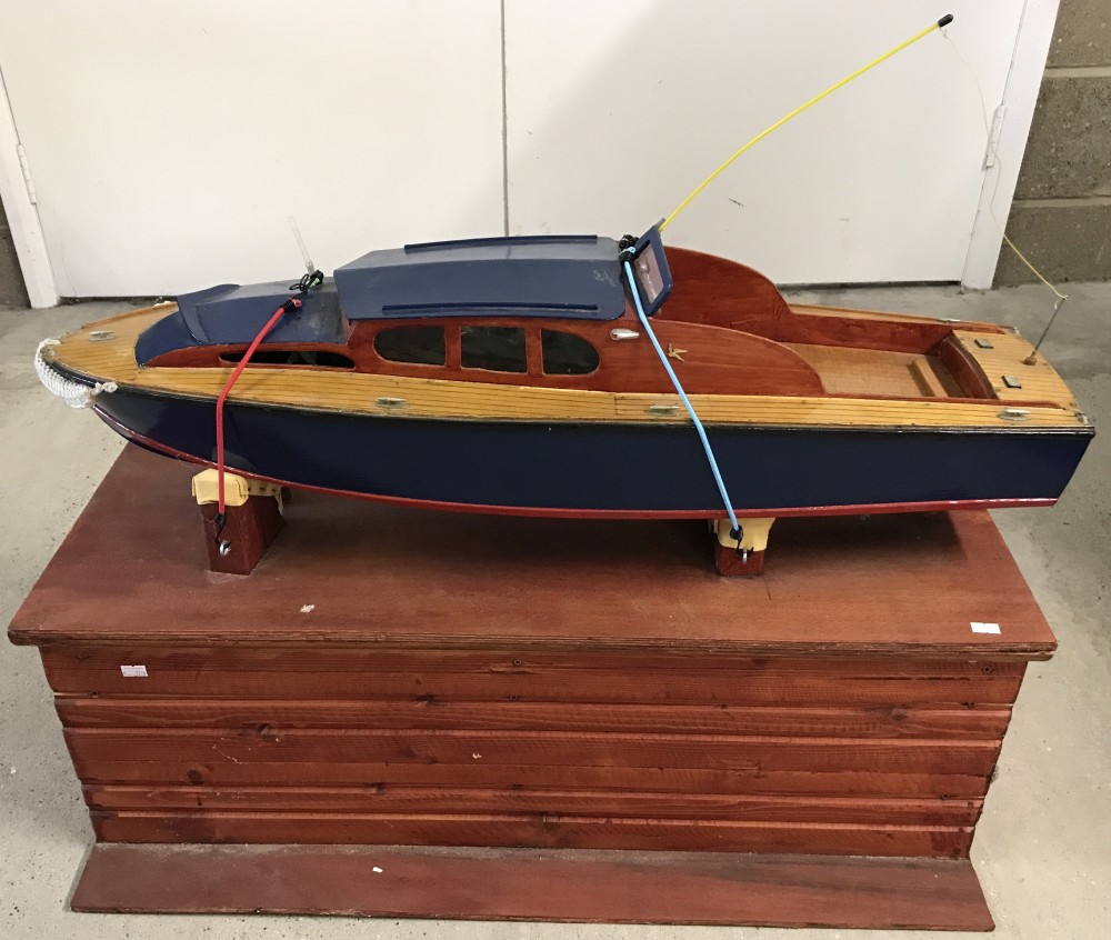 Scratch built model wooden speed boat with storage box.