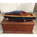 Scratch built model wooden speed boat with storage box.