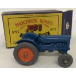 A boxed Matchbox #72 Fordson Tractor with dark orange wheel rims.