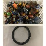 A quantity of 24 Skylanders giants play piece figures together with a Playstation 3 wireless portal.