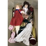 A collection of boxed and unboxed modern porcelain dolls.