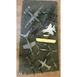 10 assembled and painted kit military aeroplanes to include a bi-plane.