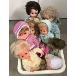 A collection of vintage vinyl dolls.